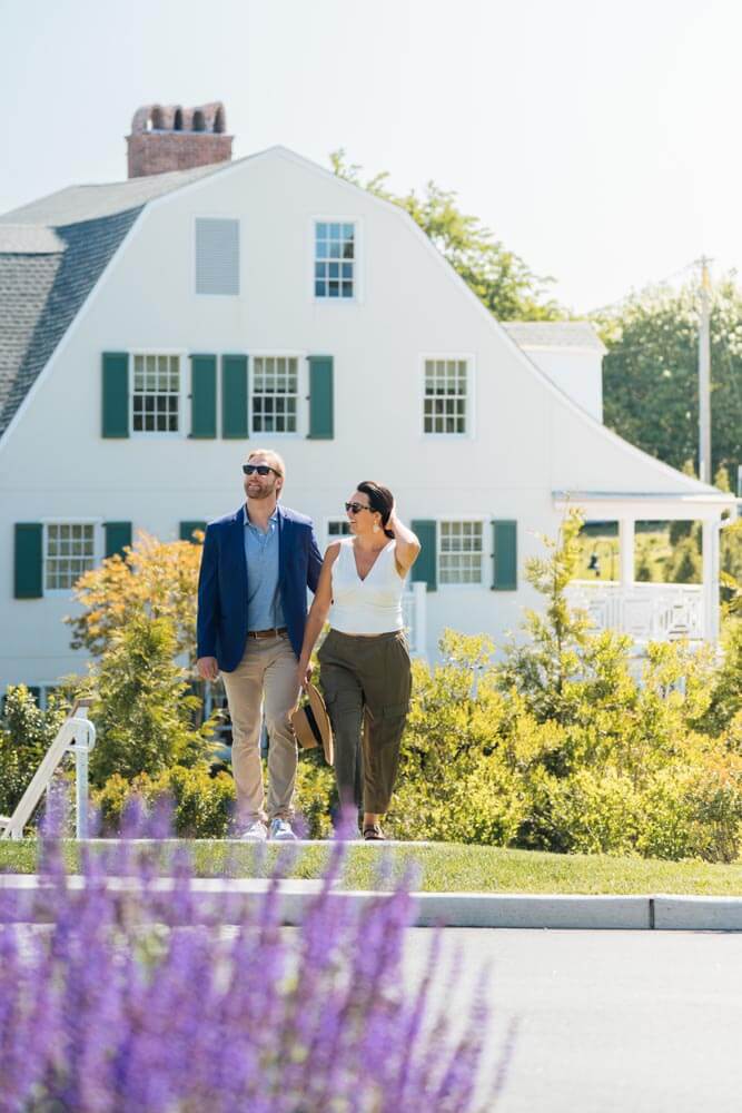 Couple walking across property